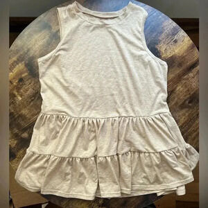 Sleeveless woman’s oatmeal color baby doll top. Size: L.